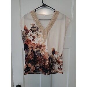 Sleevless Floal V Neck Ladies Top.
